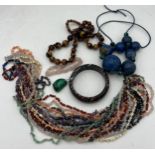 Jewellery to include lapis lazuli necklace, glass bead necklace, glass bangle, long necklaces in