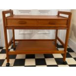 A mid century teak trolley with two drawers to front 79 w x 44 d x 71 h cm.