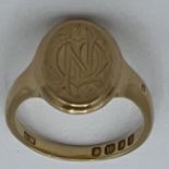 An 18 carat gold signet ring. Size S, weight 8.3gm.