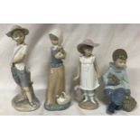 A collection of four Nao figurines to include "Boy with Catapult", "Girl with Umbrella", "Girl