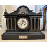 A very heavy black slate and brass 19thC mantle clock with visible brocot movement by JJS, 3