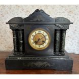 A 19thC black marble mantel clock with visible brocot movement. 32 h x 38cm w.