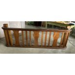 An oak balcony rail. 235cm l x 34 d x77 h.