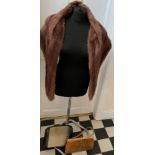 A vintage musquash shawl together with two handbags, one in seal skin and one in lizard skin and a