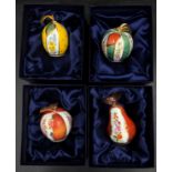A collection of Royal Worcester fruit themed candle snuffers to include pear, apple, peach and lemon