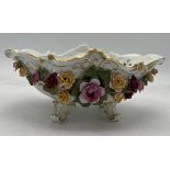 Continental porcelain basket with floral and gilt decoration. 24 x 16cm.