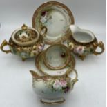 Two Noritake jugs, lidded sucrier and a cup, saucer and plate.