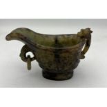 A Chinese Qing spinach green and russet jade Archaistic pouring vessel Yi. 9cm h.