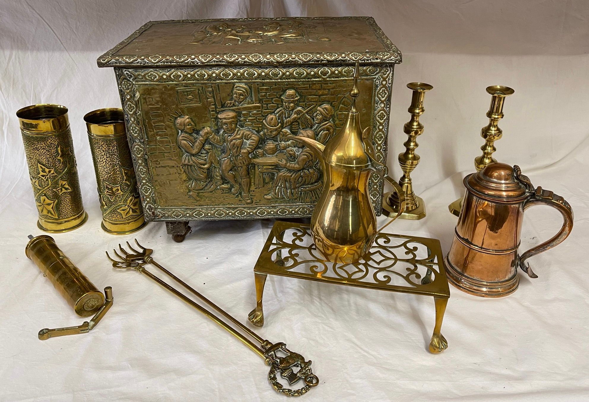 A collection of brass and copper items to include a wood lined brass storage box, a pair of