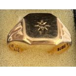 A 9 carat gold signet ring set with single diamond. Size V, weight 4gm.