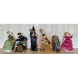 A collection of Royal Doulton figurines x 6 to include The Lobster Man HN 2317, The Wizard HN