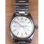 A 1975 Rolex Oyster Perpetual wristwatch on Rolex Stainless steel bracelet. Model: 6751. Ref: