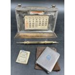 A silver & wood desk top perpetual calendar hallmarked Birmingham, 1931, W J Myatt & Co, silver