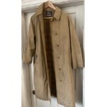 A vintage Burberry jacket with belt and concealed button fastening. Collar to hem 110cm approx,