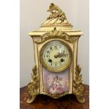 A French porcelain and ormolu mounted mantle clock by Japy Frères with decorative floral and