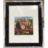 The Beatles interest - Peter Blake signature mounted on an alternate cover of the Beatles Sgt.