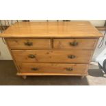A pine chest of drawers, 2 small drawers over 2 long. 106 w x 44 d x 79cm h.
