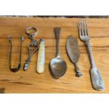 A miscellany of silver including 18thC tea tongs a/f, fork, spoon etc. total weight 140gm.