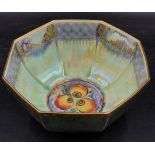 A Wedgewood lustre octagonal shaped bowl, decorated to the exterior with a dragon, and with fruit to