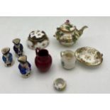 A quantity of miniature ceramics to include Crown Staffordshire Toby jug, Limoges dish, Doulton