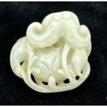 A small jade group depicting catfish, probably Qing dynasty. 5 x 5.5cm.