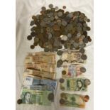 A quantity of foreign coins and notes: 1,050 Dirhams of Morocco, 1,000 Lire, others to include