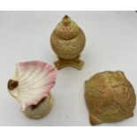Three pieces of Grainger Worcester to include dolphin and shell 10cm h, reticulated lidded jar and a