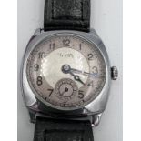 A 1940's Tudor cushion wristwatch. Case 28mm. Stamped to inner case 266038. 1178. 157. R.W.C. Ltd.