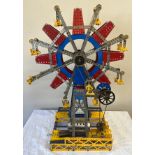 A Meccano window display model of a steam engine Ferris wheel approx. dimensions 71cm h x 54cm w x