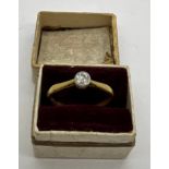 Solitaire diamond ring set in yellow metal, marks rubbed. Weight 1.5gm. Size K.