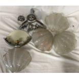 A retro vintage early 20th Century Art Deco ceiling light lamp fixture comprising of three clam