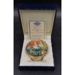 A boxed Limited Edition Moorcroft enamel trinket box entitled 'Robins' numbered 17/50 to base and