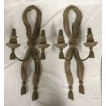 Pair of carved ornate wooden wall sconces in a ribbon design with tassels (see image) 54cm h x