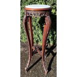 Ornately carved hardwood stand with marble top 92cm h x 40 cm d.