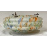 An early 20th Century Art Deco 1930's glass ceiling hanging light lamp shade. Mottled finish with
