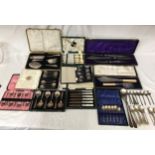 Assorted boxed silver plated ware comprising Walker & Hall carving set, fish servers, cake