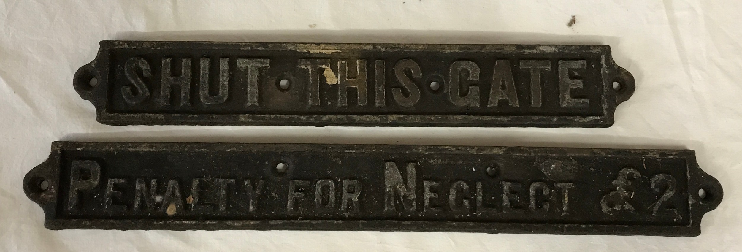 Two cast iron signs one reading "Penalty for neglect £2" and the other "Shut this gate" largest 53
