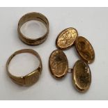 Nine carat gold to include a decorative wedding band, size T, pair of foliate engraved cuff links