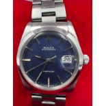 A Rolex Oysterdate Precision stainless steel wristwatch with blue face, on Rolex stainless steel