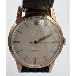 A 1960's 9ct gold Rolex Precision gentleman's presentation wristwatch with cream dial on black