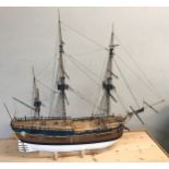 A fine scale model of Captain James Cook's Ship HMS Endeavour mounted on a plywood base and