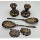 Two silver decanter labels for Sherry and Whisky, two apostle spoons and a pair of weighted