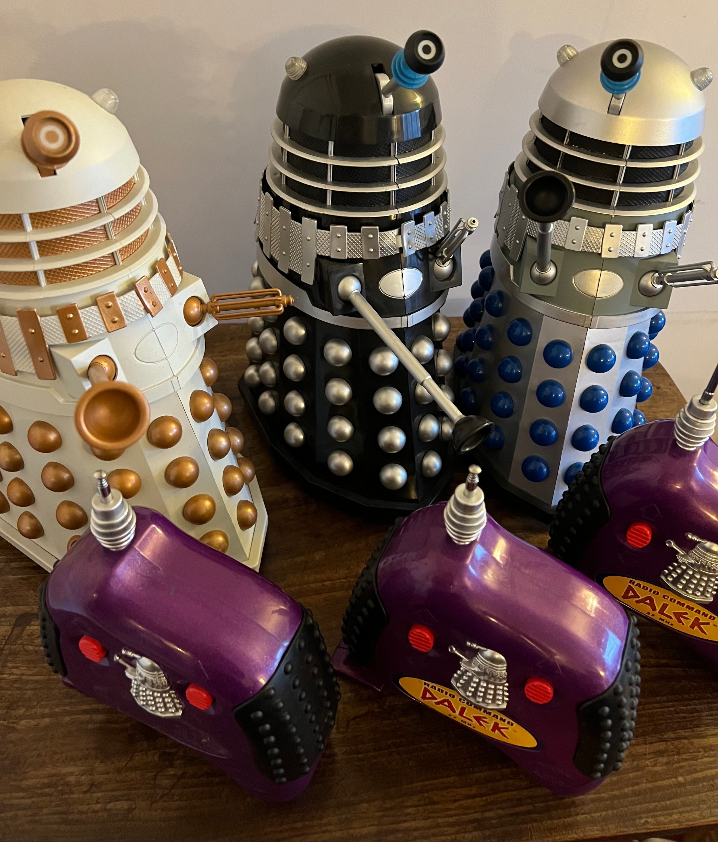 Three product Enterprise battery operated Daleks 31cm h together with three radio commands.