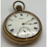A Waltham gold plated pocket watch with white enamel dial and subsidiary seconds dial.
