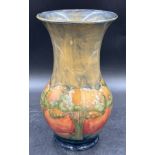 A Moorcroft Pottery vase in the 'Eventide' pattern designed by William Moorcroft signed to base 24.
