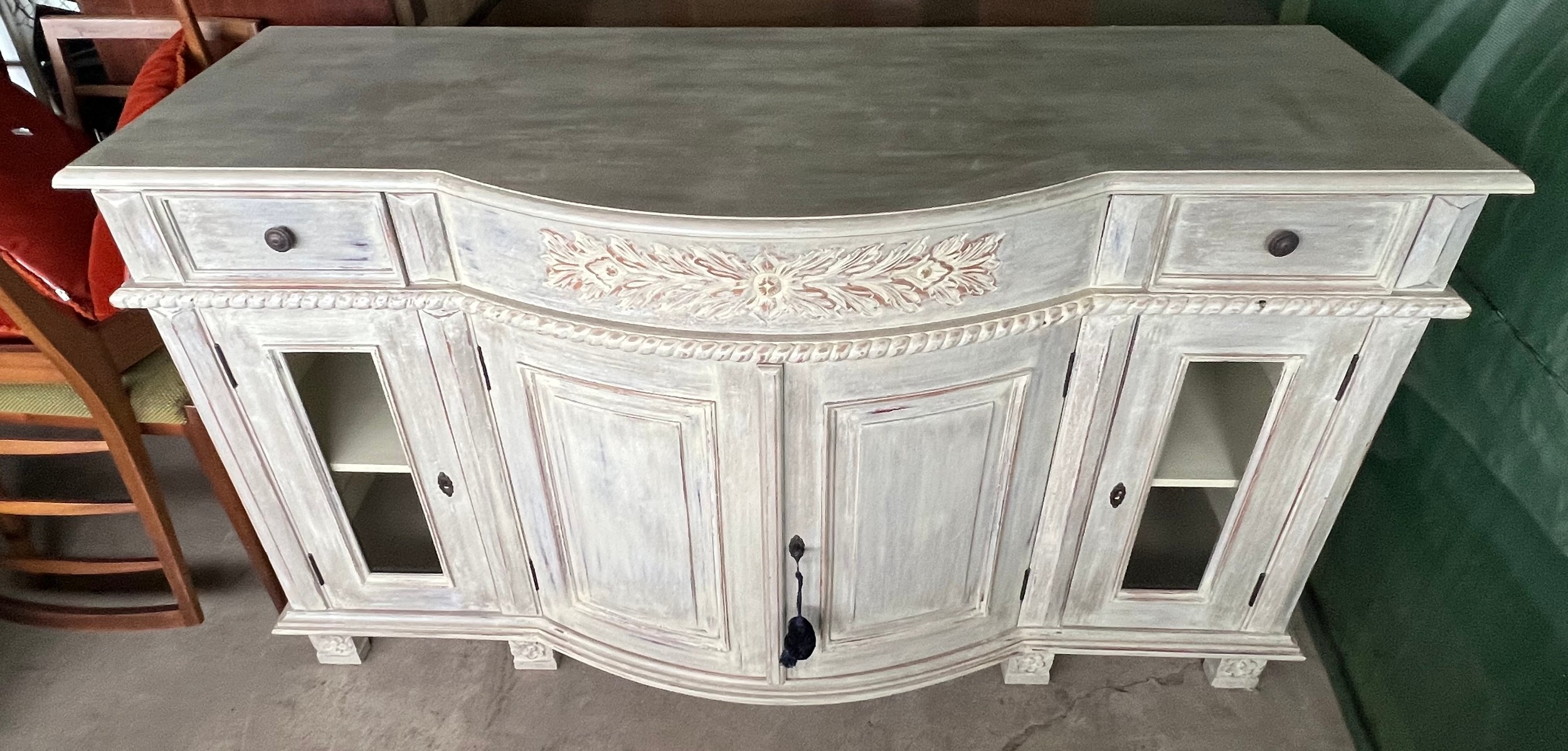 A white painted sideboard with double doors flanked by glazed doors and 2 drawers to top 152w x