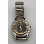 Universal Geneve Polerouter Date Automatic Microtor gentleman’s vintage wristwatch. Numbered to back