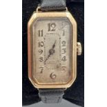 A 1928 ladies Rolex Marconi 9ct gold wristwatch on black leather strap. Back of case reads 20 and