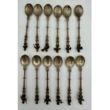 A set of twelve figural orchestral spoons from Niekerk, Holland. Total weight 180gms.