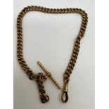 A 9 carat gold watch chain with T bar and clip, weight 15.2 gm. 29cm l. Each link, T bar and clip